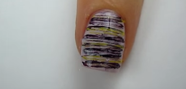 She Presses Dental Floss Across Her Nail. When Shes Done. It Look Incredibly Cool