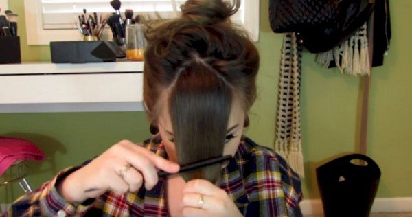 At First Glance This Was A Crazy Way To Cut Her Bangs, But Watch How She Parts Her Hair. This is Genius!