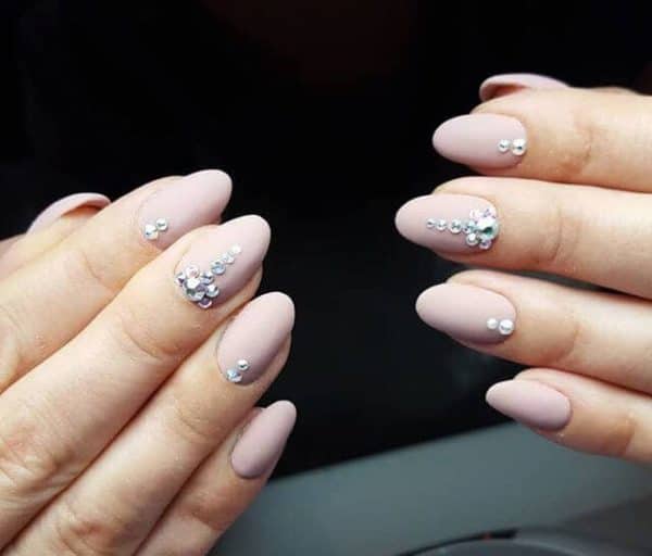 Sophisticated Nude Manicure Designs That Scream Elegance And Style