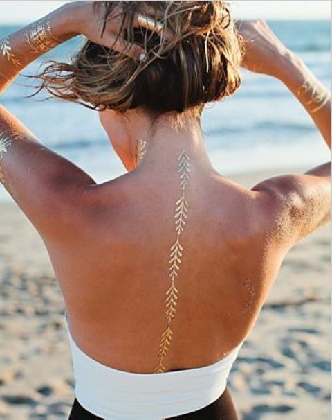 Shiny Gold Tattoos That Are Perfect For The Summer